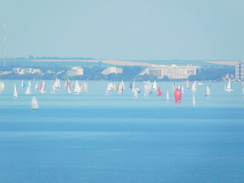 Scenic view of sea against clear blue sky