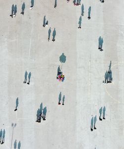 Aerial view of people on street in city