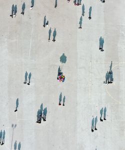 High angle view of people walking in city