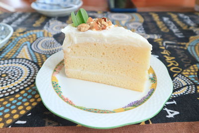 Close-up of cake served on table