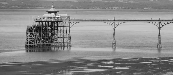 Pier over sea against sky