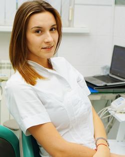 Portrait of smiling female doctor at hospital
