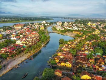 High angle view of river amidst buildings in city