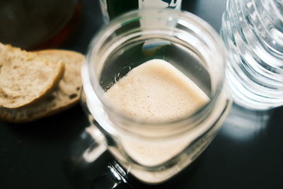 High angle view of drink in glass jar on table