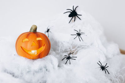 Close-up of jack o lantern on snow