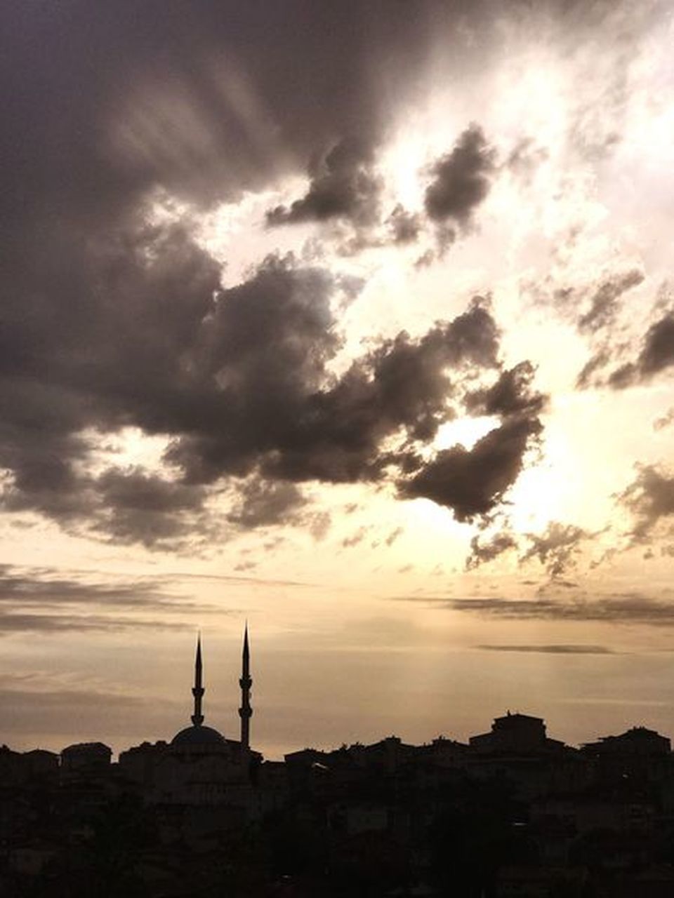 SILHOUETTE OF BUILDING AT SUNSET