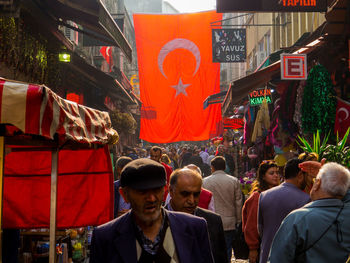 People on street market in city