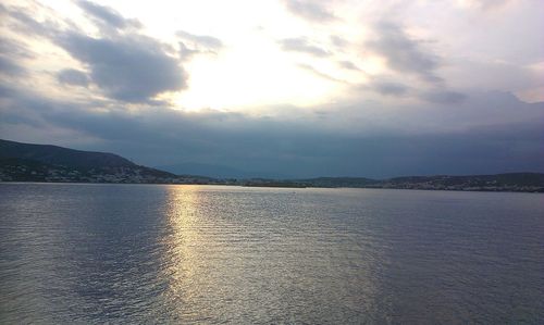 Scenic view of sea against cloudy sky