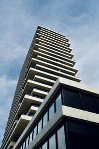 Low angle view of modern building against sky