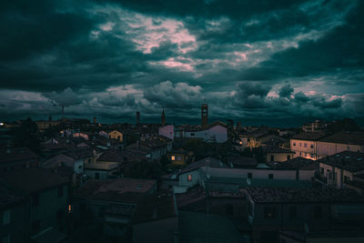 Aerial view of town against sky