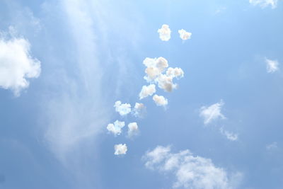 Low angle view of white blue sky