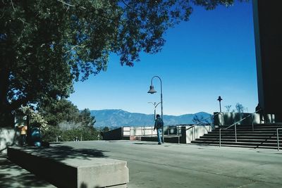 View of mountain range against blue sky