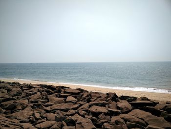 Scenic view of calm sea against clear sky