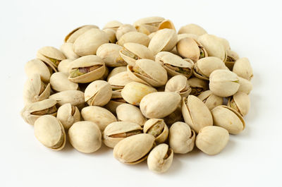 Close-up of roasted coffee against white background