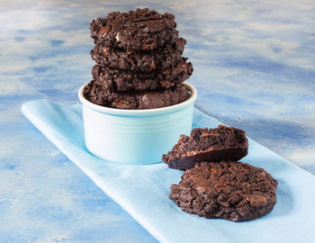 Close-up of chocolate cookies on napkin