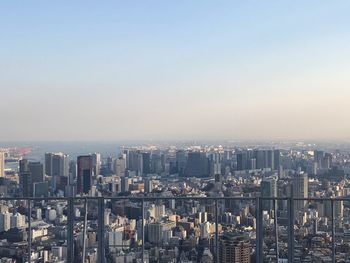 High angle view of buildings against sky in city
