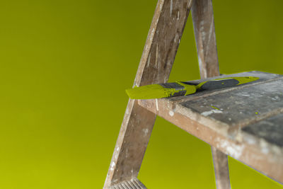 Close-up of metallic structure on wood