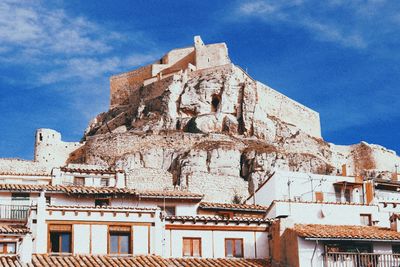 Low angle view of old building against sky