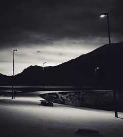 Scenic view of mountains against sky at night