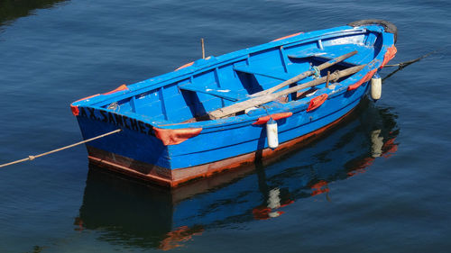 High angle view of fishing boat moored in sea