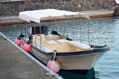 High angle view of nautical vessel moored on lake