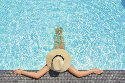 High angle view of woman in swimming pool