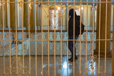 Woman walking in corridor