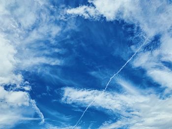 Low angle view of vapor trail in sky