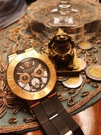 High angle view of clock on table