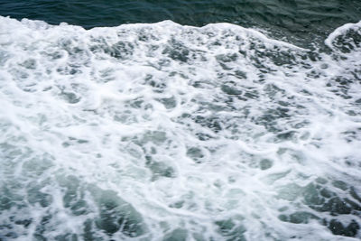 High angle view of waves in sea