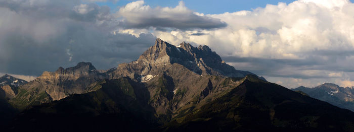 Panoramic view of mountain range against sky