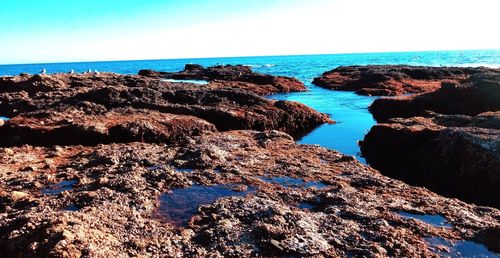 Scenic view of sea against clear sky