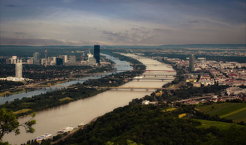 High angle view of river amidst buildings in city
