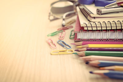 Close-up of school supplies on table