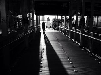 People walking in tunnel