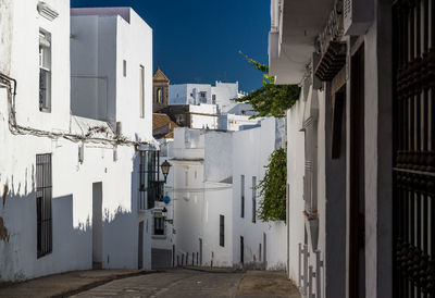 Lane amidst buildings in town