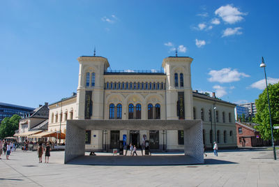 Group of people in front of building