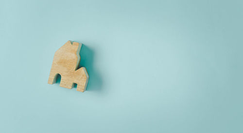 High angle view of stuffed toy against white background