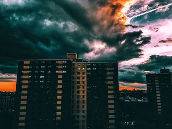 City against sky during sunset