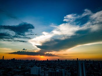 Cityscape against sky during sunset