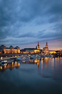 Reflection of illuminated buildings in water