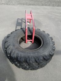 High angle view of red tire on road