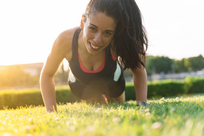 Portrait of smiling woman on field