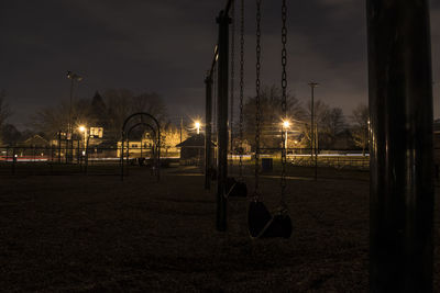 Illuminated street light at night