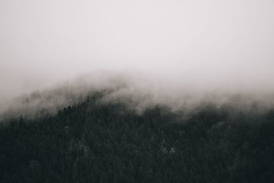 Scenic view of clouds over landscape against sky