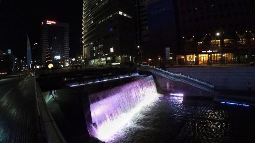 Bridge over river at night