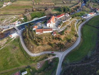 High angle view of road amidst buildings in village - serpins 