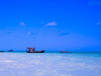 Boats in calm sea