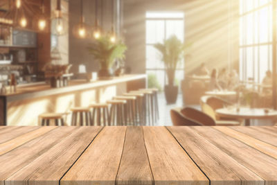 Close-up of wooden table at restaurant