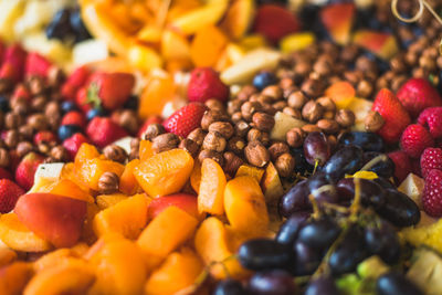 Close-up of fruits arranged in plate